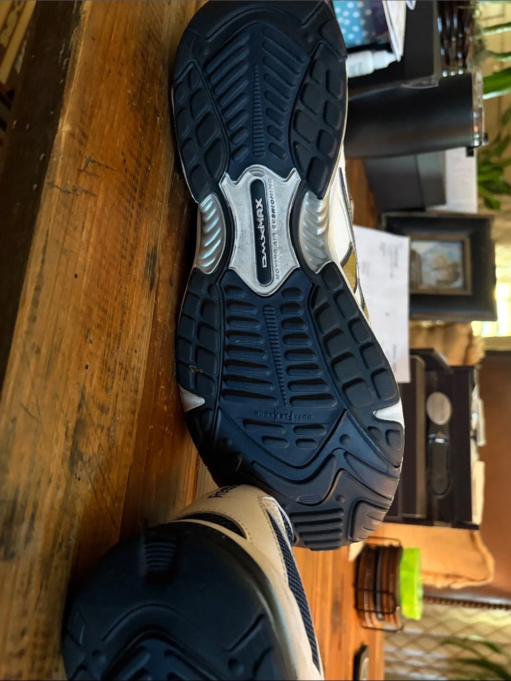 Like New Reebok size 10.5 Men's White and Navy Athletic Sneakers with Gold Accen